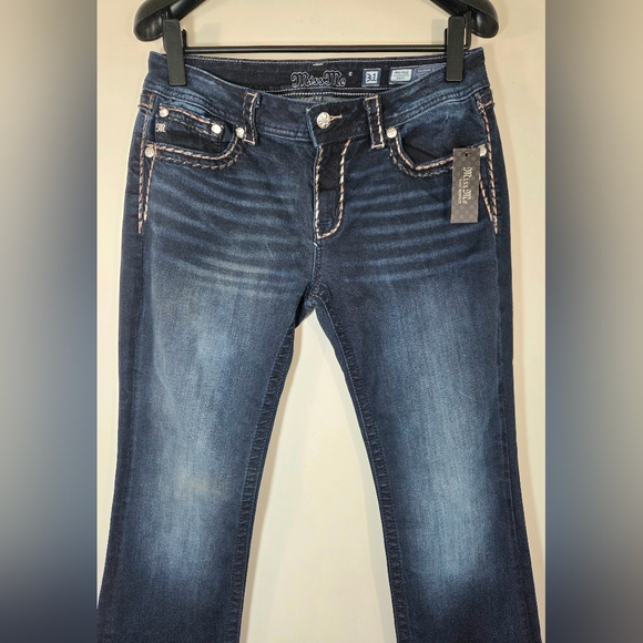 NEW MISS ME MID-RISE BOOTCUT JEANS. - Picture 2 of 8